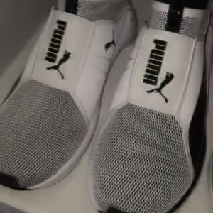 Kylie Jenner black and white Pumas